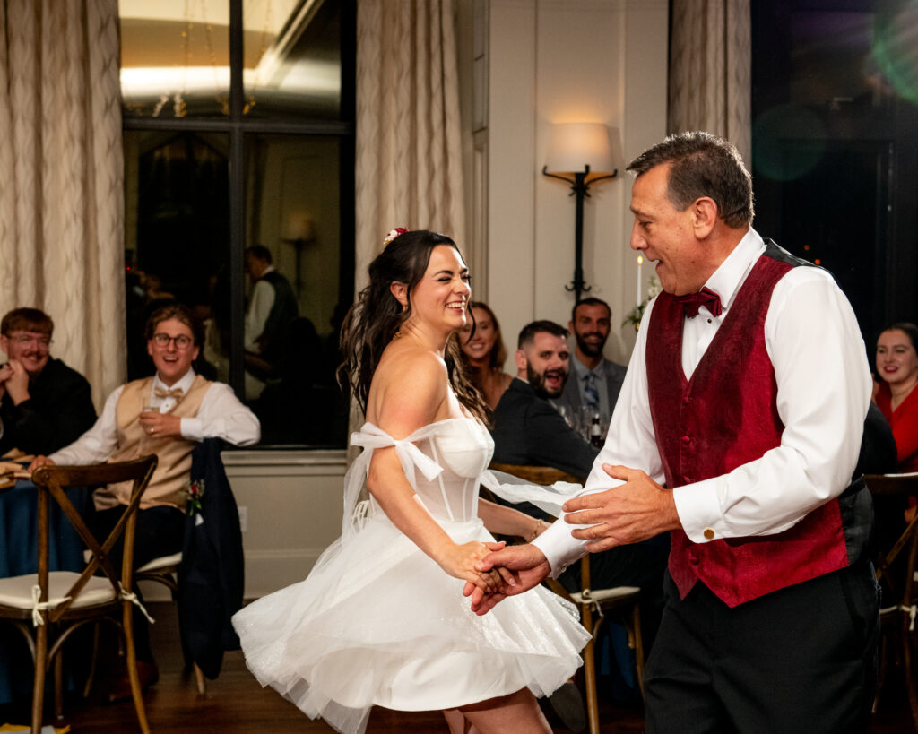 bride and dad dancing