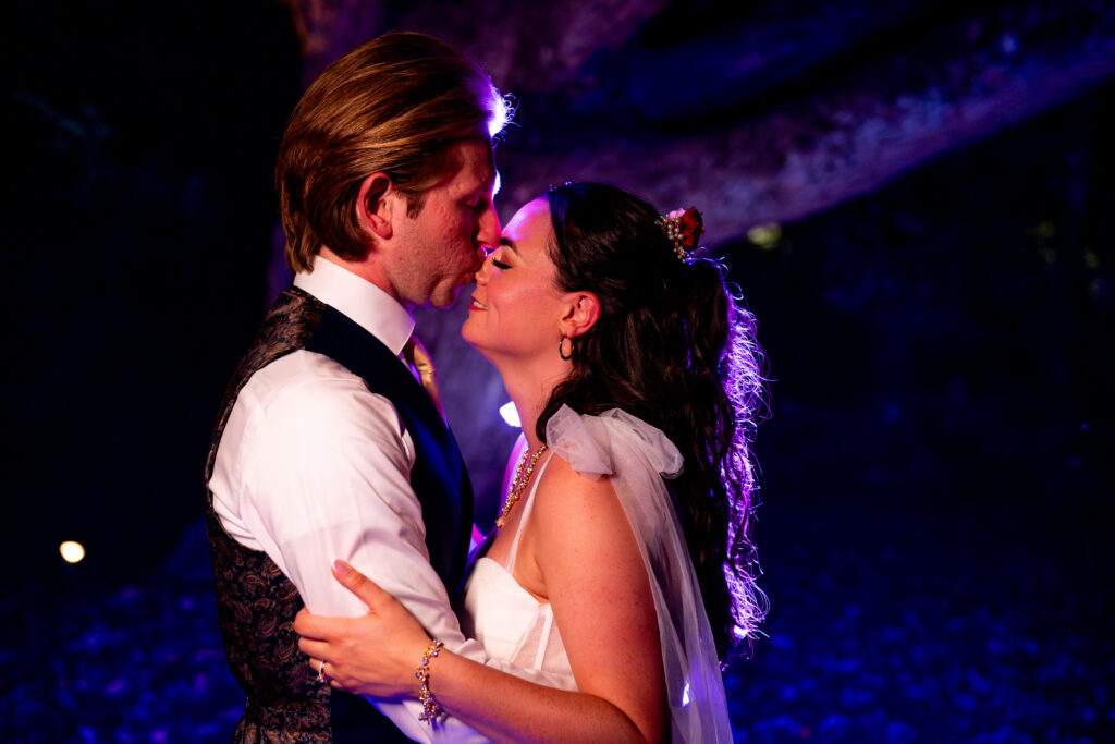 groom kissing bride's nose