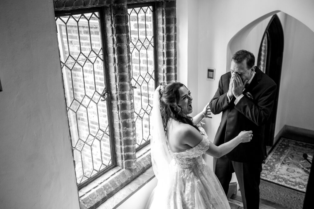 dad seeing bride for the first time while bride smiles