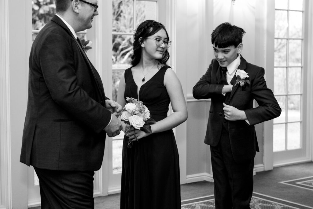 boy grabbing ring from his pocket