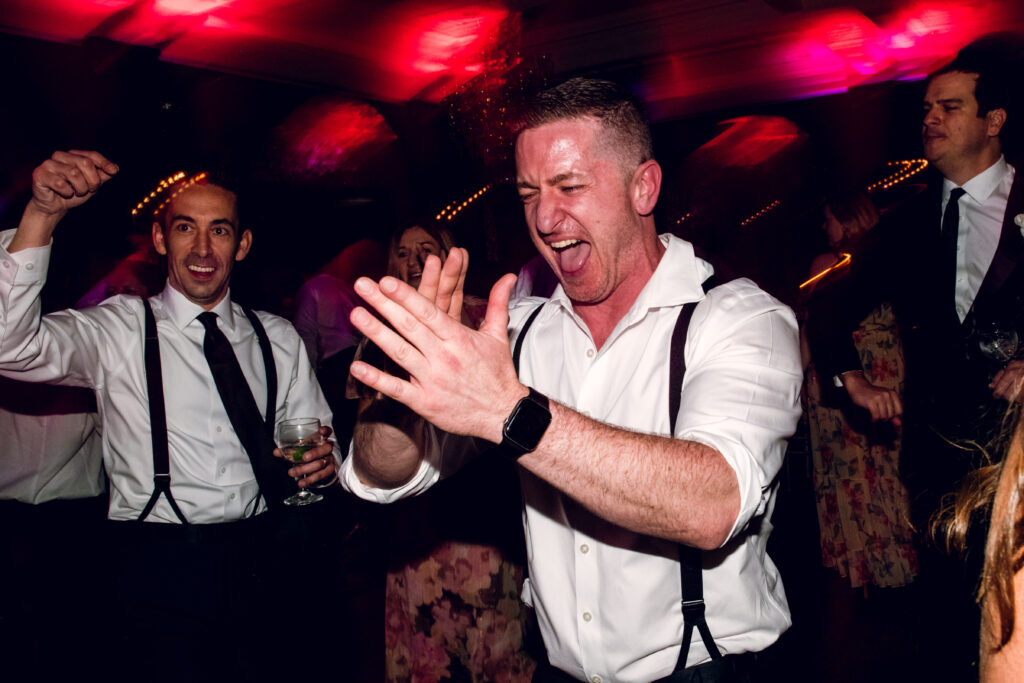 men dancing on the dance floor