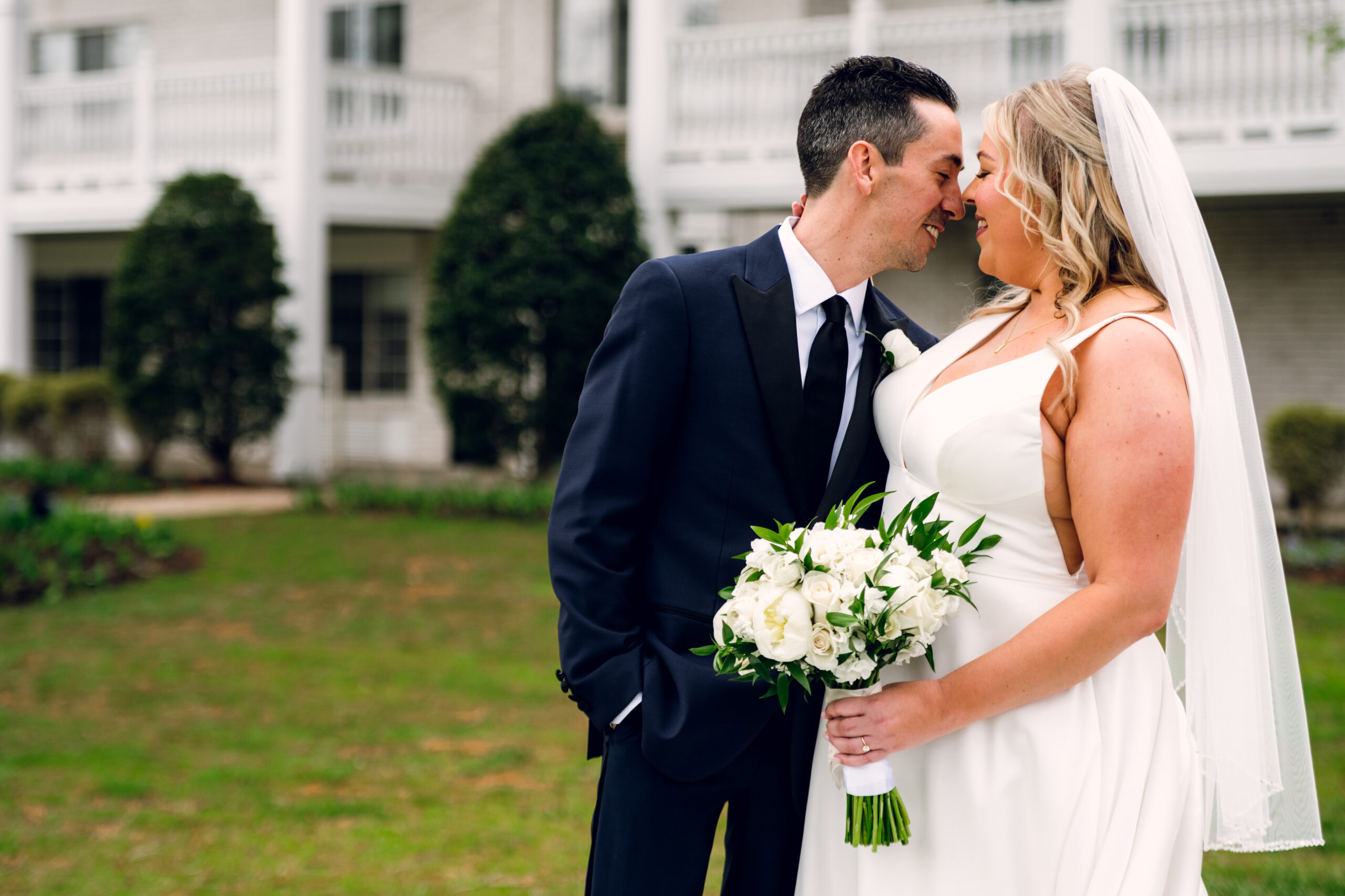 bride and groom snuggling noses