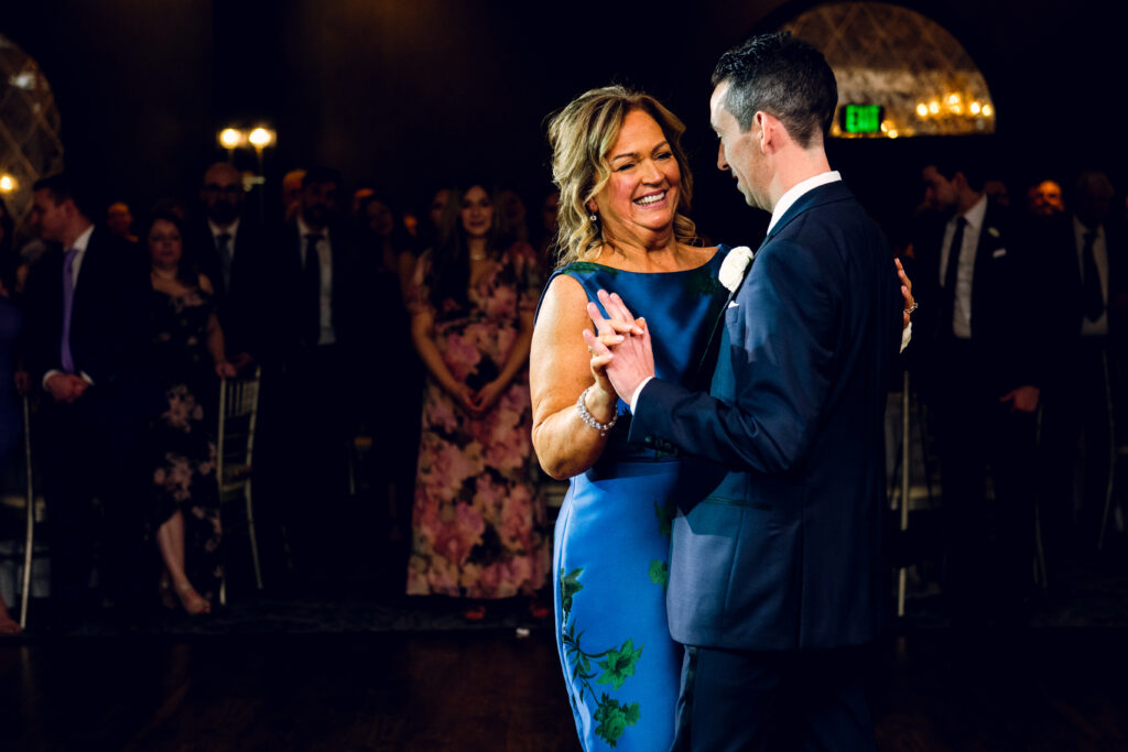 groom and mom dancing