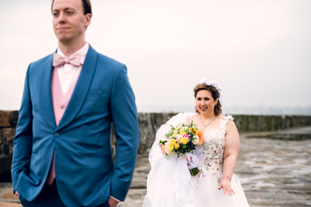bride walking up to groom for a first look at their wedding
