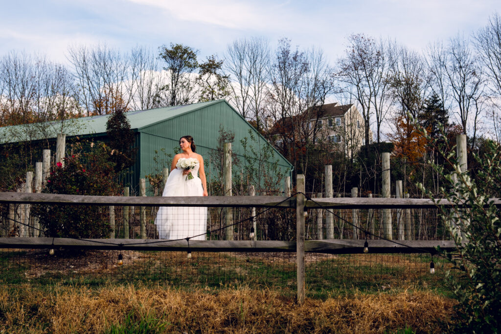 bride standing in the fields at bear brook valley